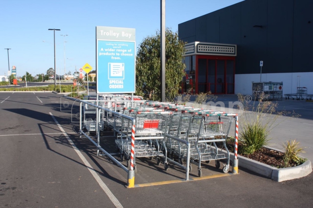 Shopping trolley bays built using Interclamp Trolley Bay kits from the retail system range, demonstrating the ease of assembly with provided fittings and tubes, requiring no specialised equipment.